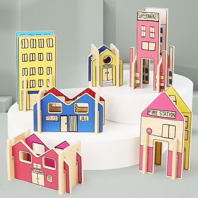 Colorful model buildings on a white platform against a gray background