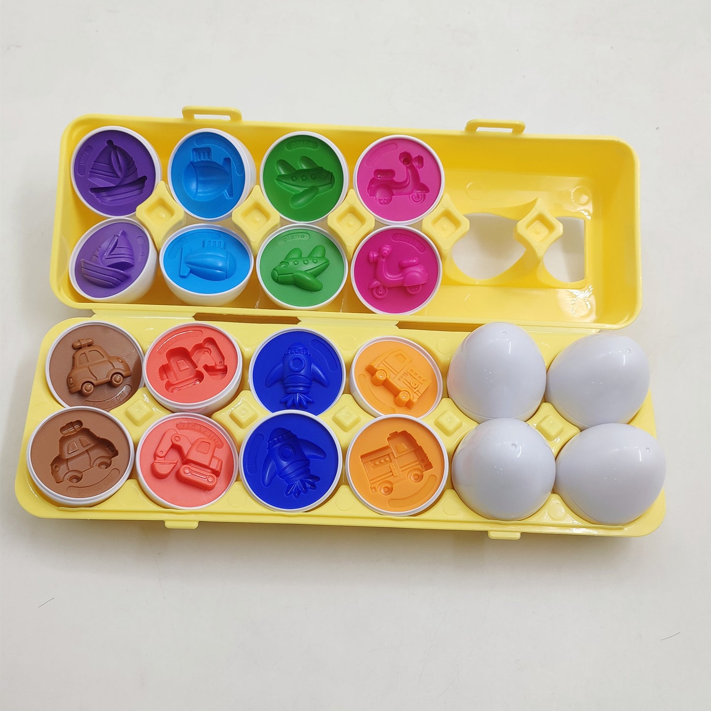 Colorful mold set with various shapes on a white background