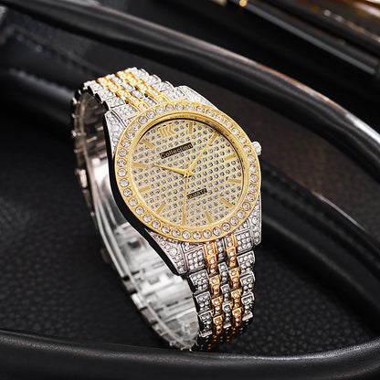 Luxury watch with gold and silver band on a black background