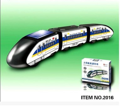 Model train set with packaging on a green background