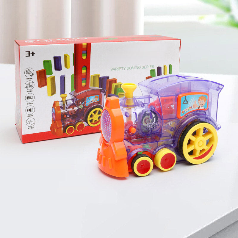 "Kids playing with automatic domino train creating domino patterns"