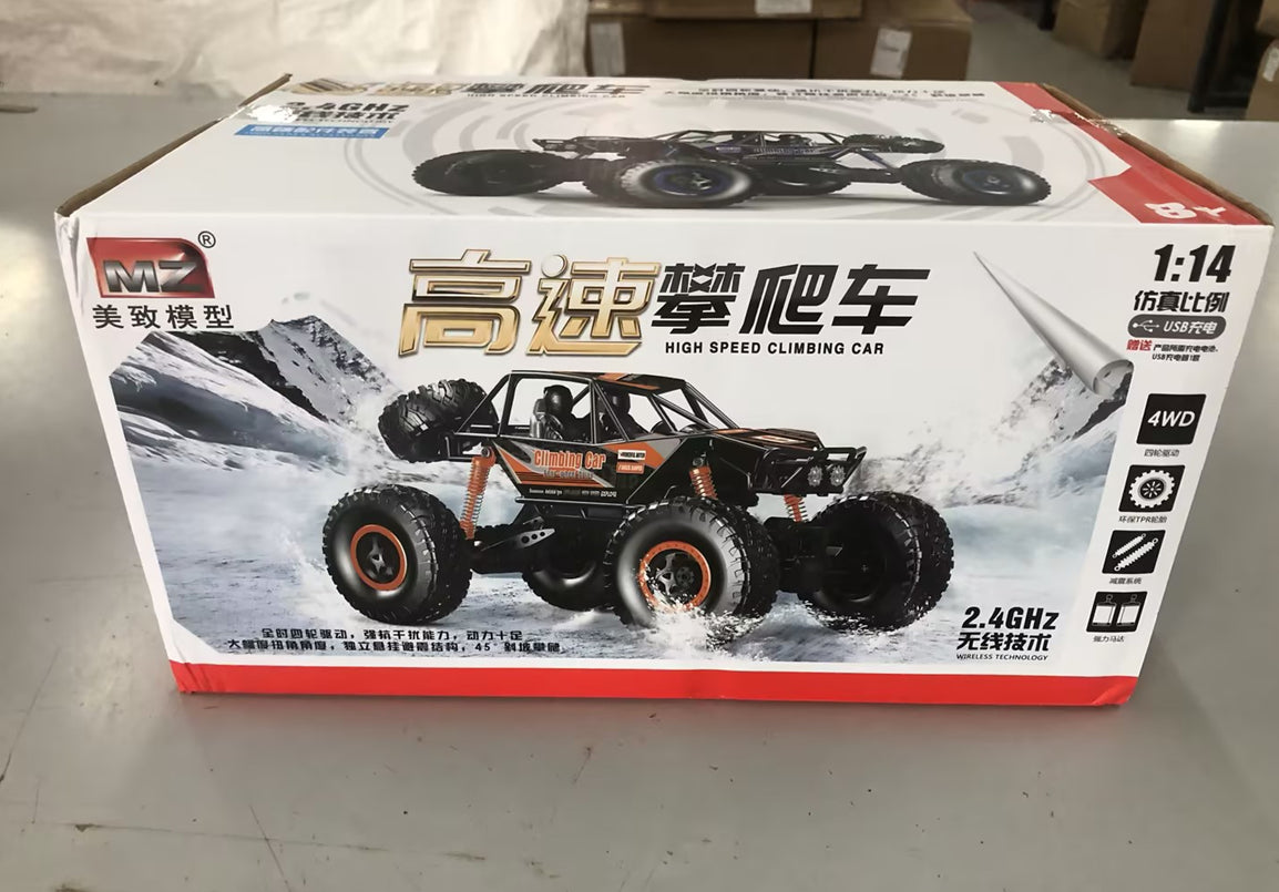 "All-terrain remote control car driving on grass and dirt outdoor surface"